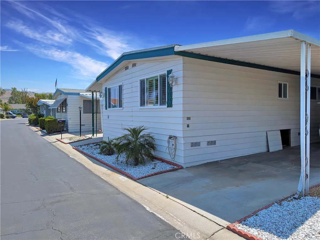 a front view of a house with garage