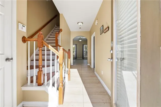 a view of a hallway with front door