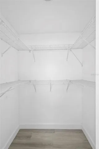 a view of a room with racks on the wall