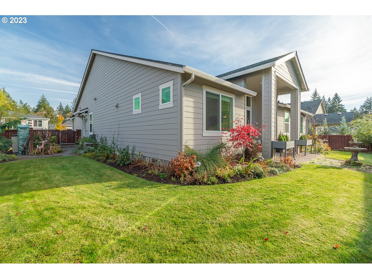 1819 South 50th Place Ridgefield, WA 98642 - Photo 35 of 48 a front view of house with yard and green space