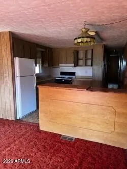 a view of a kitchen with a sink