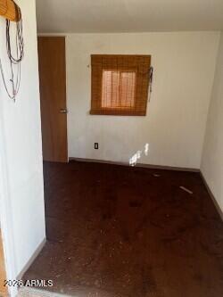 14320 East Bradshaw Road Dewey, AZ 86327 - Photo 18 of 19 a view of a livingroom with wooden floor and a window
