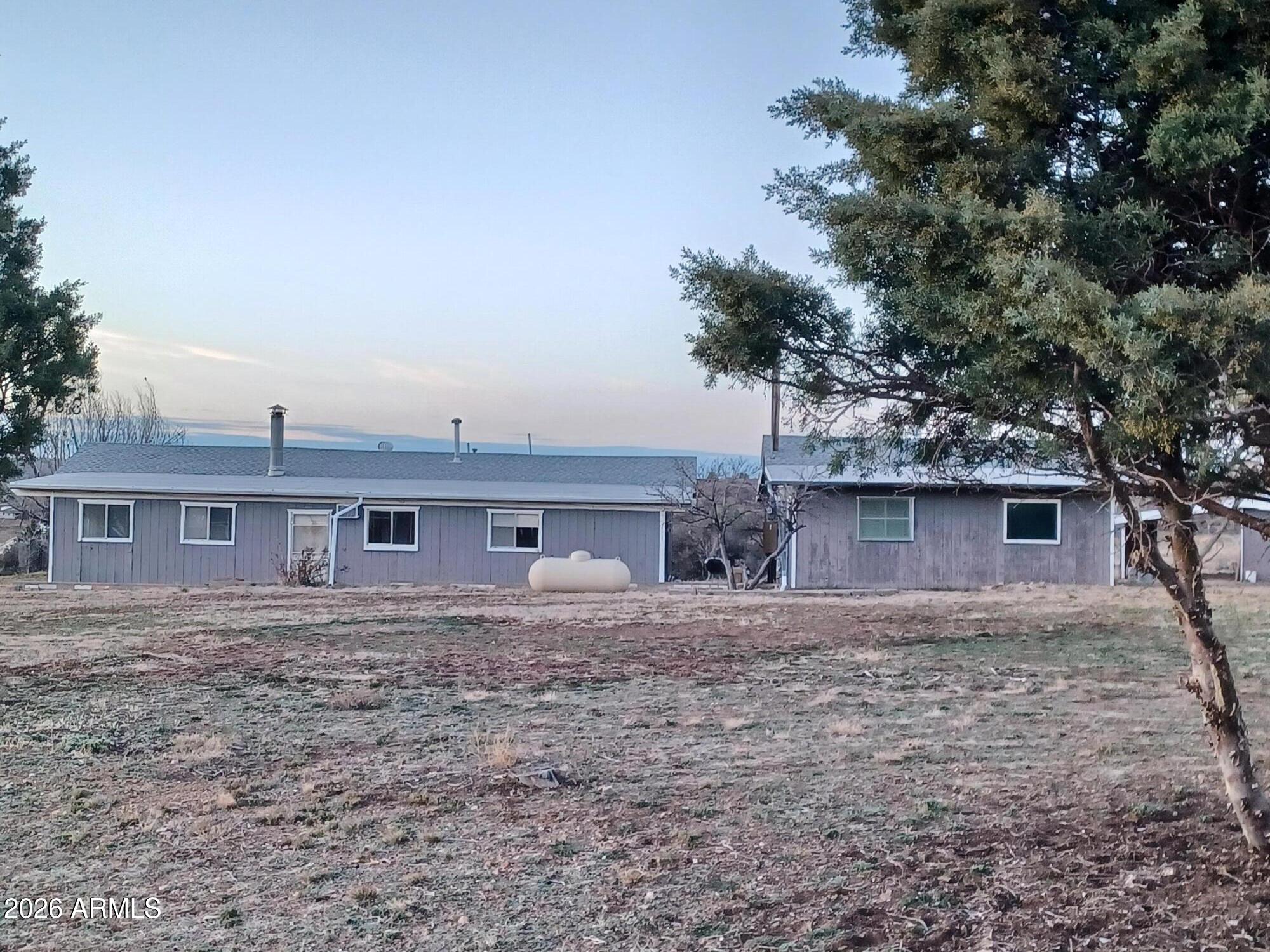 14320 East Bradshaw Road Dewey, AZ 86327 - Photo 19 of 19 a house view with a backyard space
