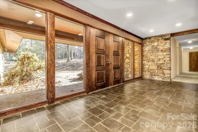 an empty room with windows