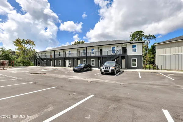 a view of a house that has a patio