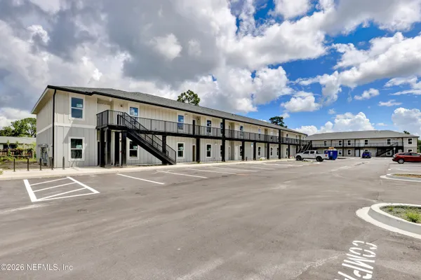 a view of car parked in front of house