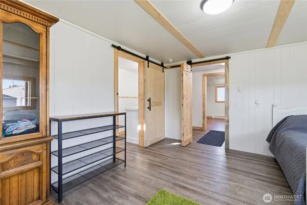 a view of entryway with wooden floor