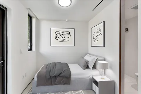 a view of a patio with table and chairs potted plants with wooden fence