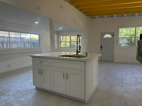 821 North B Street Lake Worth Beach, FL 33460 - Photo 4 of 9 a bathroom with a sink and a large mirror