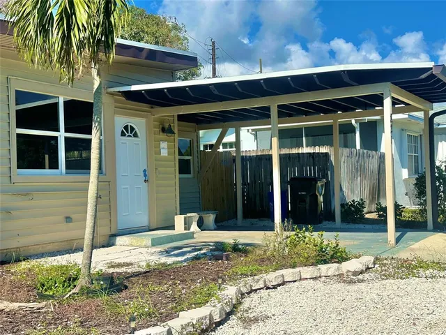 a view of a house with a porch
