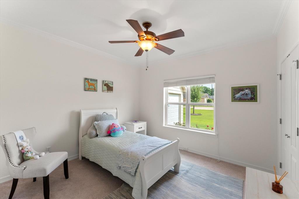 345 Rains County Road 3390 Emory, TX 75440 - Photo 29 of 39 a bedroom with a bed and a window