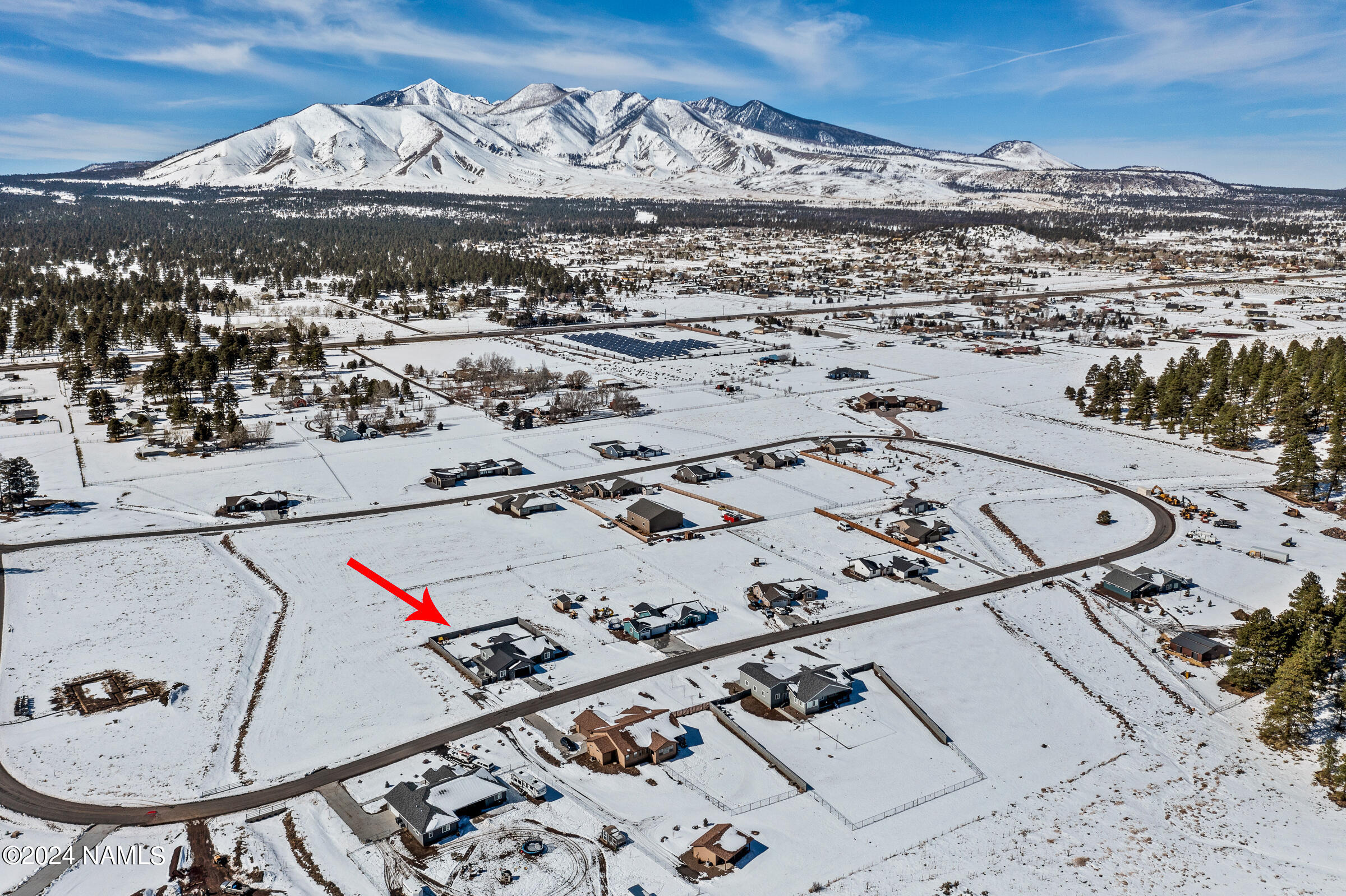 6525 Johnson Ranch Road Flagstaff, AZ 86004 - Photo 8 of 44 Winter aerial from front