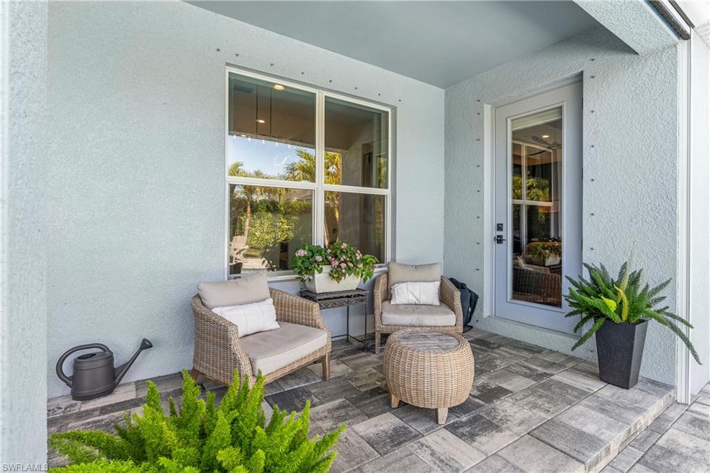 29 Johnnycake Drive Naples, FL 34110 - Photo 30 of 42 a living room with furniture
