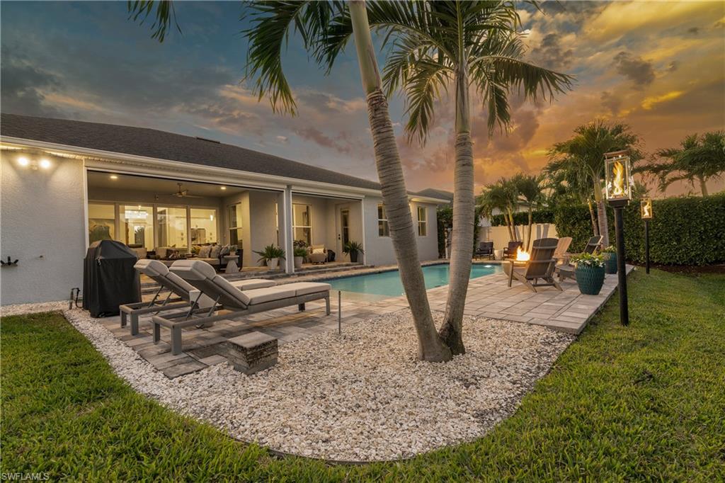 29 Johnnycake Drive Naples, FL 34110 - Photo 3 of 42 a view of outdoor space with seating area
