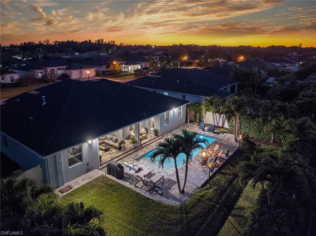 29 Johnnycake Drive Naples, FL 34110 - Photo 38 of 42 a view of a house with a ocean view