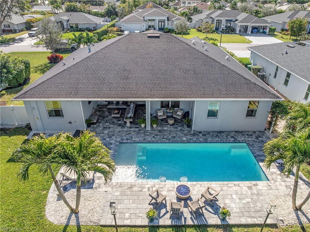 29 Johnnycake Drive Naples, FL 34110 - Photo 40 of 42 an aerial view of a house with a yard