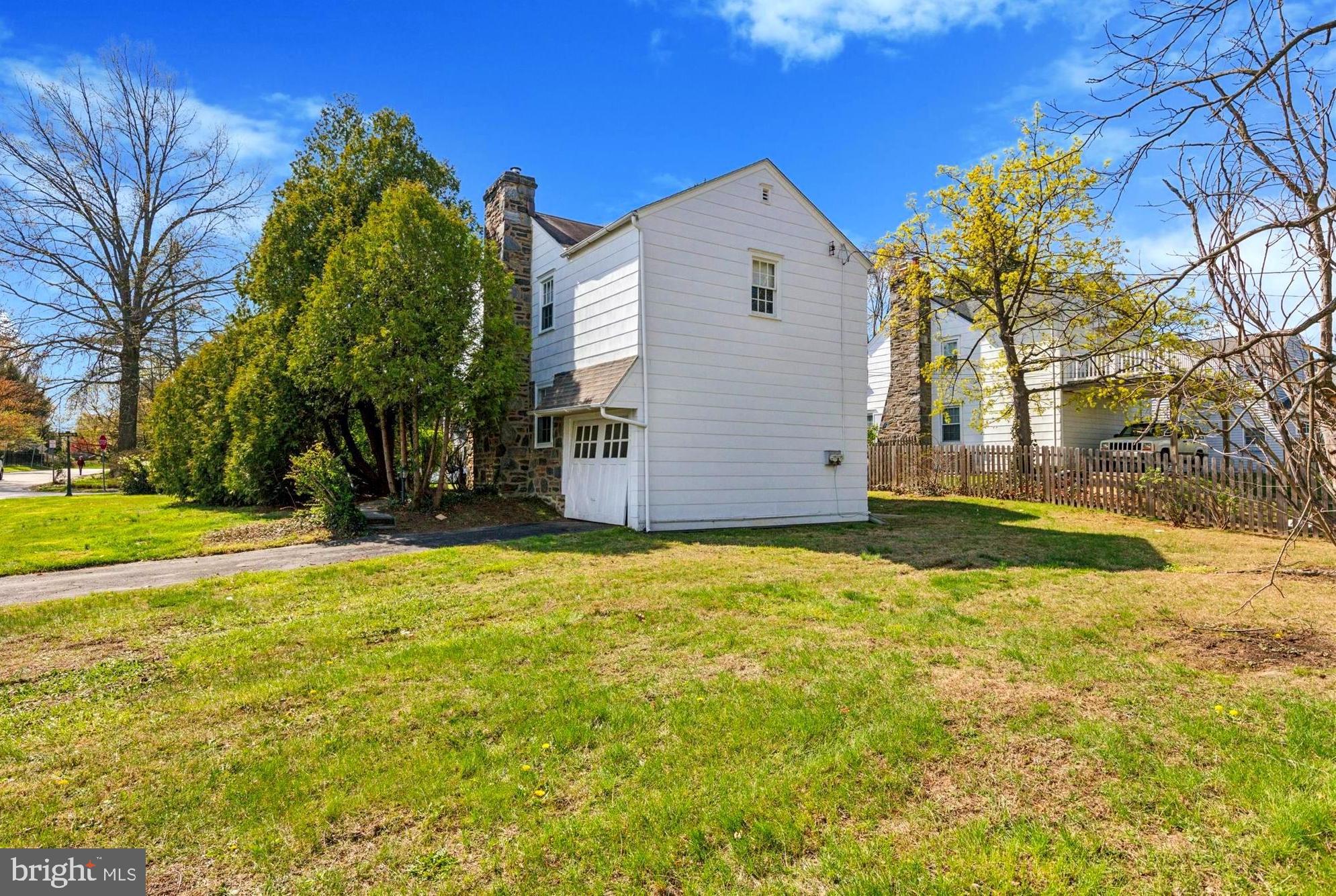 219 Williamsburg Road Ardmore, PA 19003 - Photo 3 of 14 a view of a house with a yard