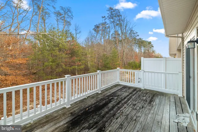 a view of multiple houses with a street