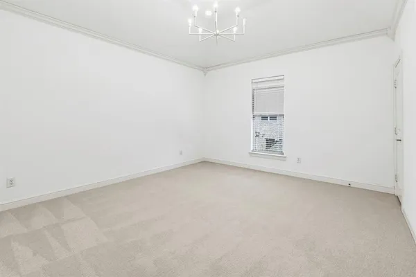 an empty room with a empty space and windows