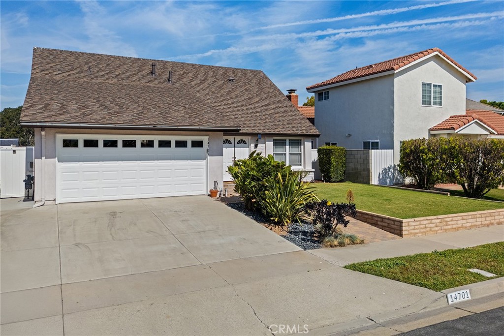 14701 Doncaster Road Irvine, CA 92604 - Photo 1 of 1 front view of a house with a yard