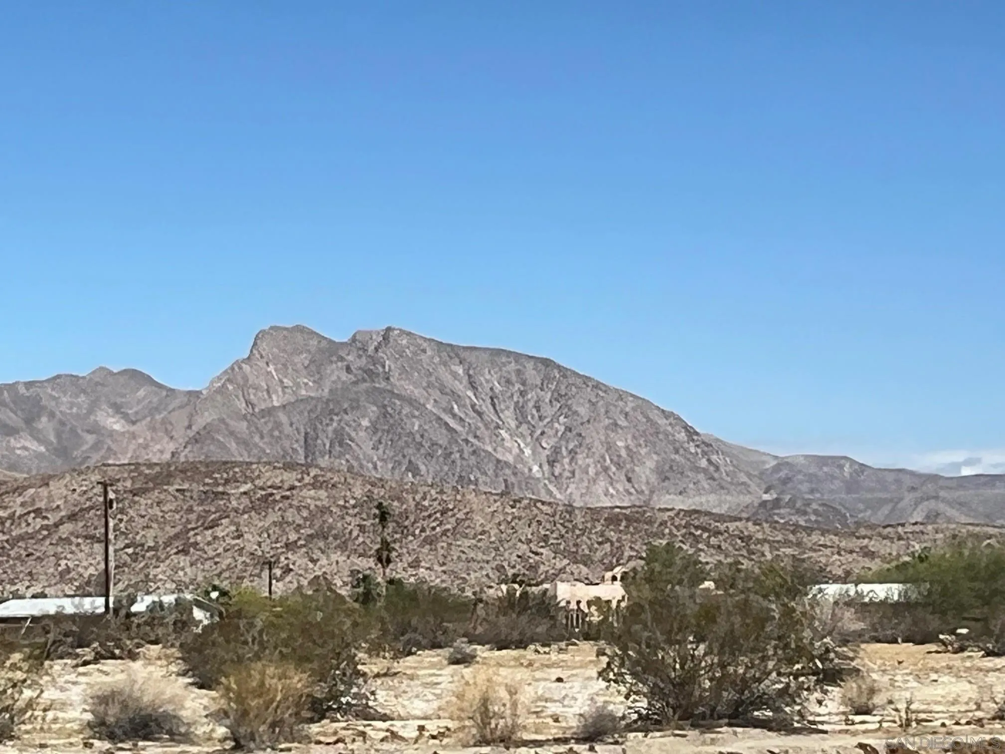 Borrego Springs Road, Unit 131 Borrego Springs, CA 92004 - Photo 2 of 10 a view of a large building with mountains in the background
