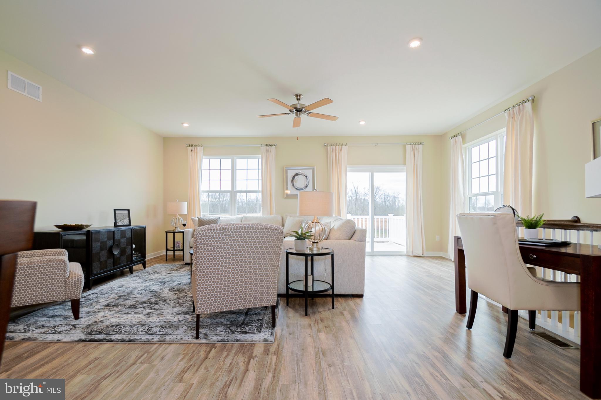 208 Case Road Townsend, DE 19734 - Photo 12 of 18 a living room with furniture and wooden floor