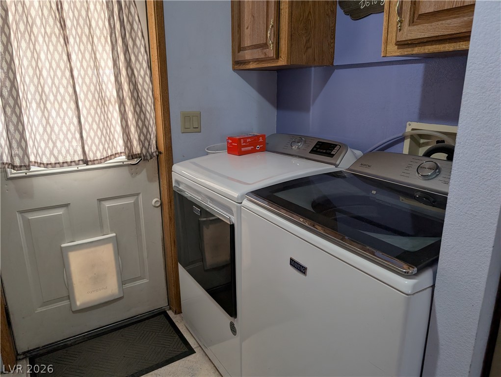 320 6th Street Panaca, NV 89042 - Photo 20 of 30 Laundry room with independent washer and dryer and cabinet space
