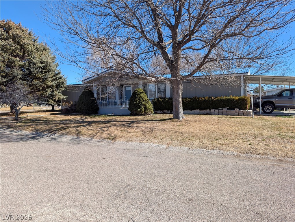 320 6th Street Panaca, NV 89042 - Photo 2 of 30 View of front of property featuring a front yard