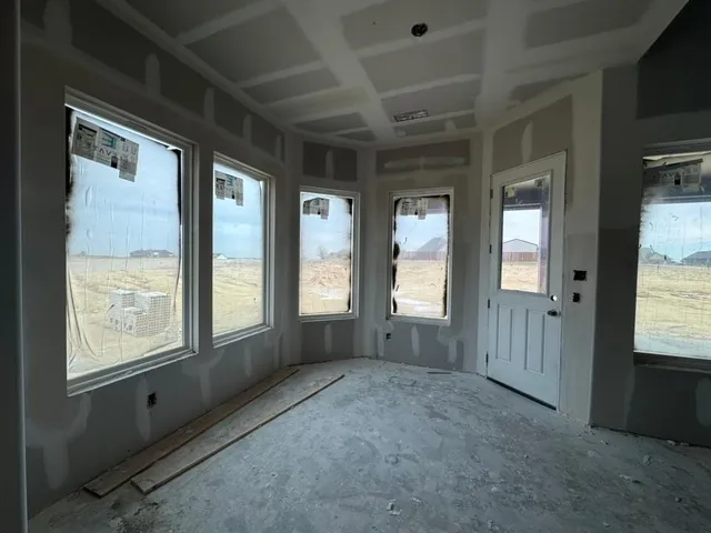 wooden floor and windows in an empty room