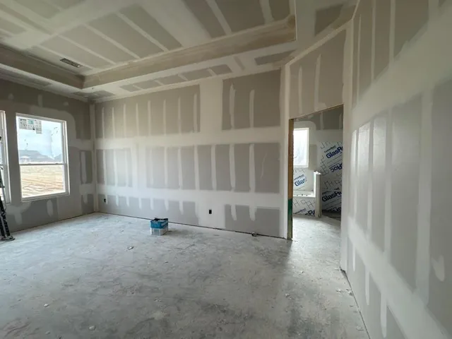 an empty room with windows