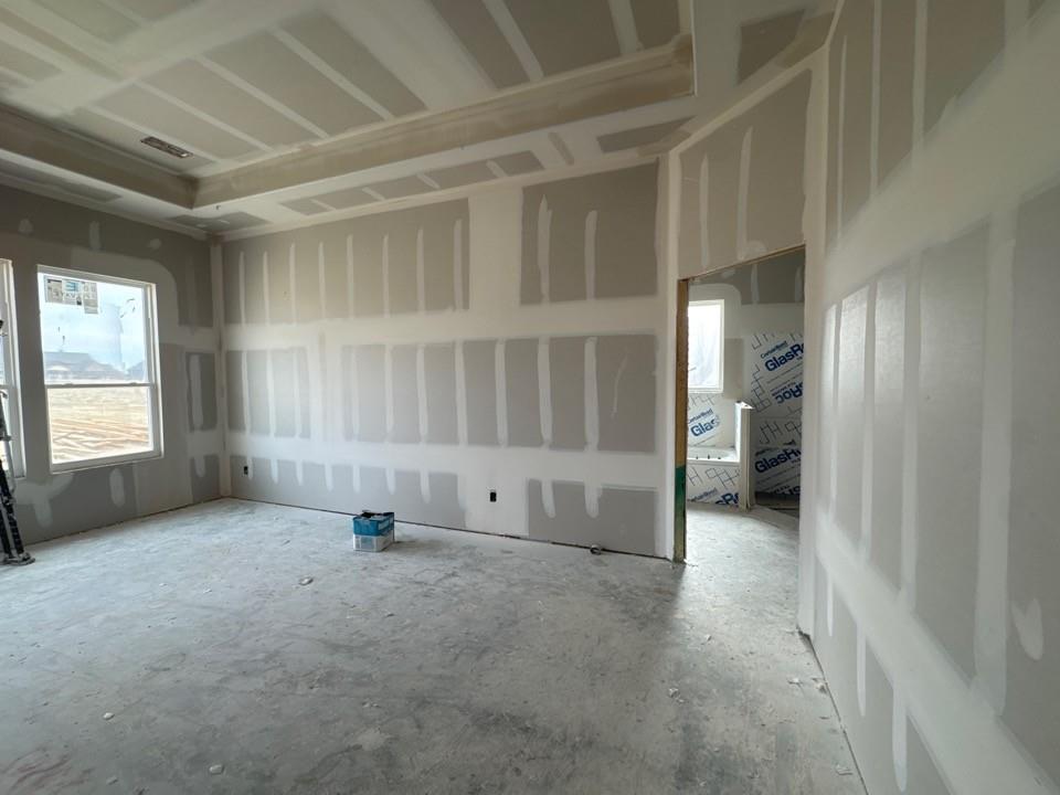 192 Brandywine Trail Rhome, TX 76078 - Photo 7 of 11 an empty room with windows