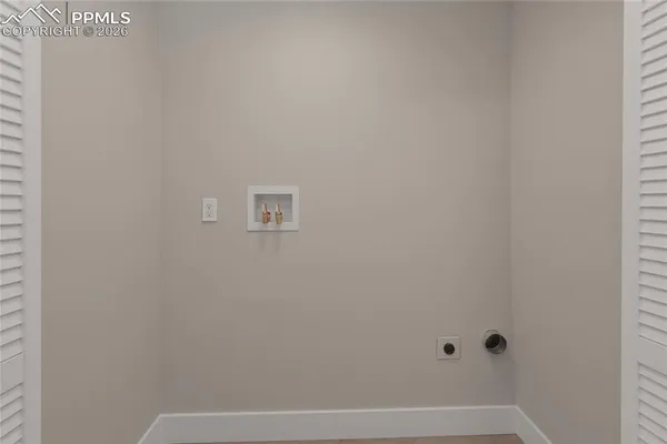 a view of bathroom with white bath tub