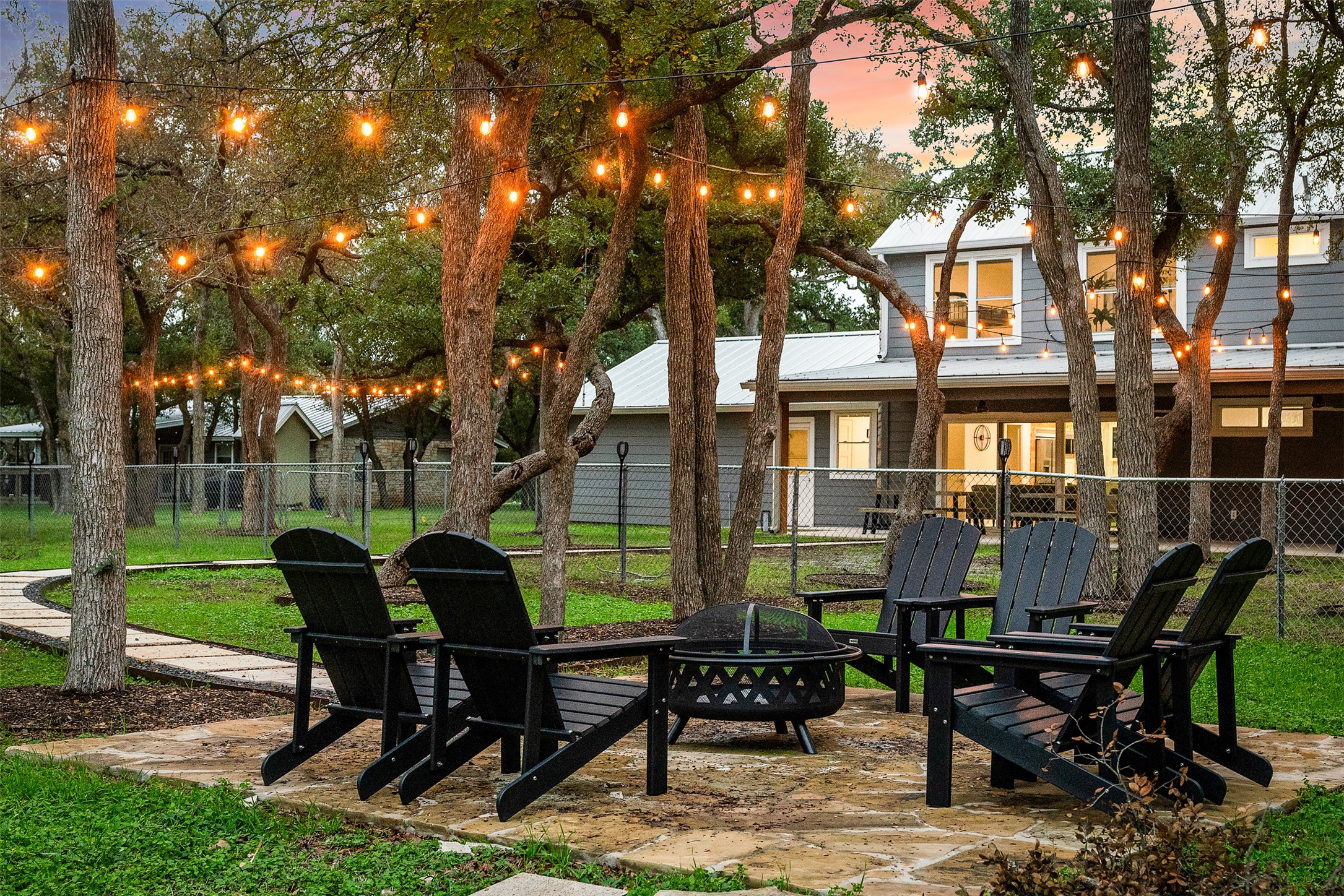 1100 Live Oak Road Leander, TX 78641 - Photo 11 of 40 a view of a house with backyard and sitting area