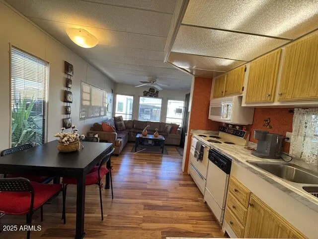 a kitchen with lots of counter top space and a dining table