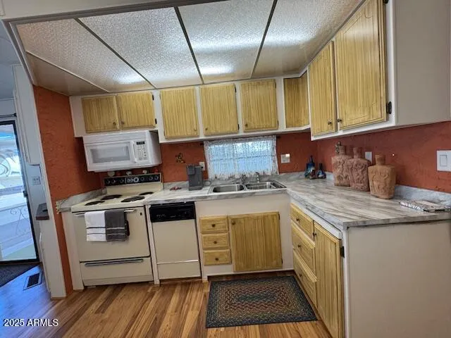 a kitchen with a stove and a sink