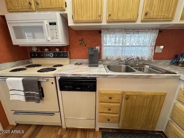 a kitchen with a stove and a microwave