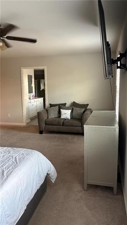 4475 Merrigold Way Fairburn, GA 30213 - Photo 12 of 22 a living room with furniture and a rug