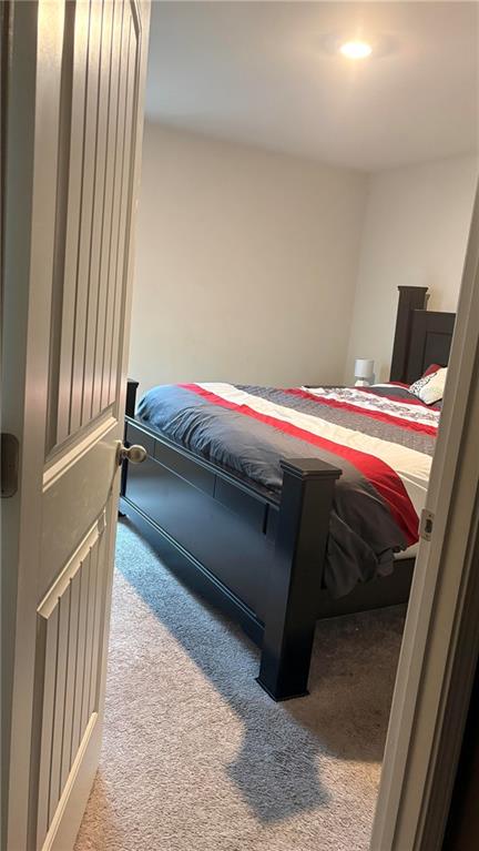 4475 Merrigold Way Fairburn, GA 30213 - Photo 16 of 22 a bedroom with a bed and a window