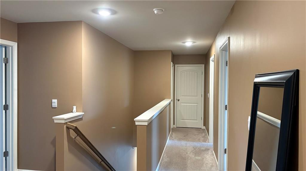4475 Merrigold Way Fairburn, GA 30213 - Photo 10 of 22 a view of hallway with shower