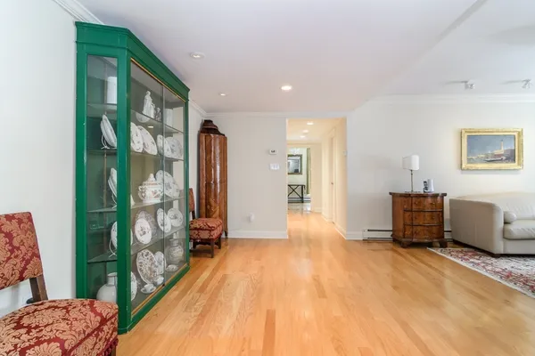 a view of a bedroom with furniture and a bed