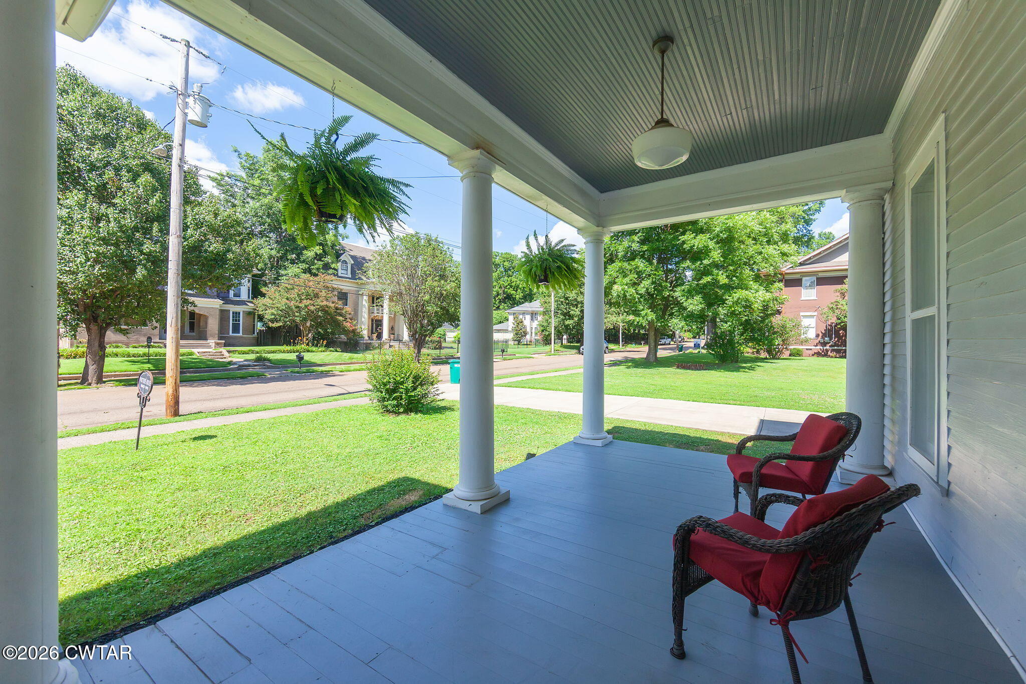554 East Main Street Jackson, TN 38301 - Photo 45 of 60 a view of a porch with furniture and a yard