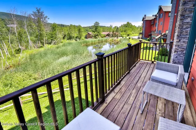 a view of a balcony with city view