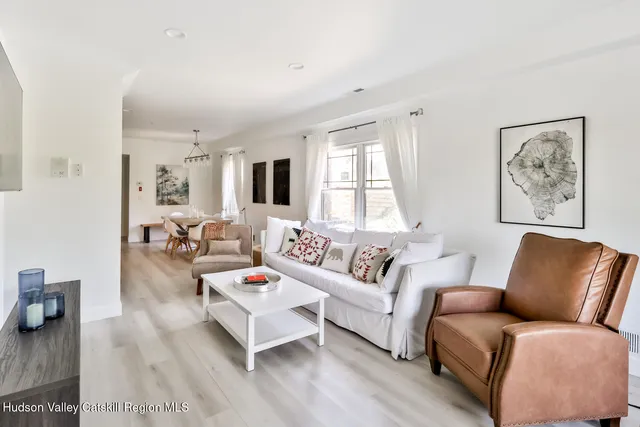 a living room with furniture and a couch