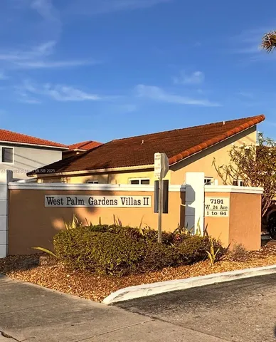 a view of a house with a street