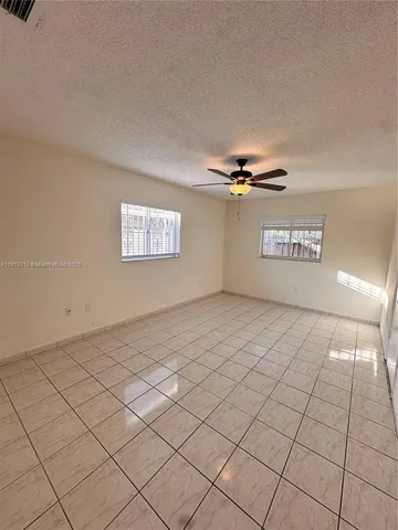 a view of a room has a window