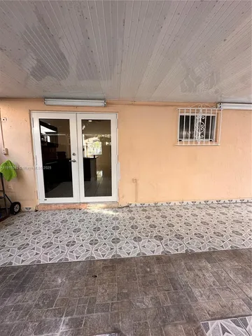 a view of a house with a snow