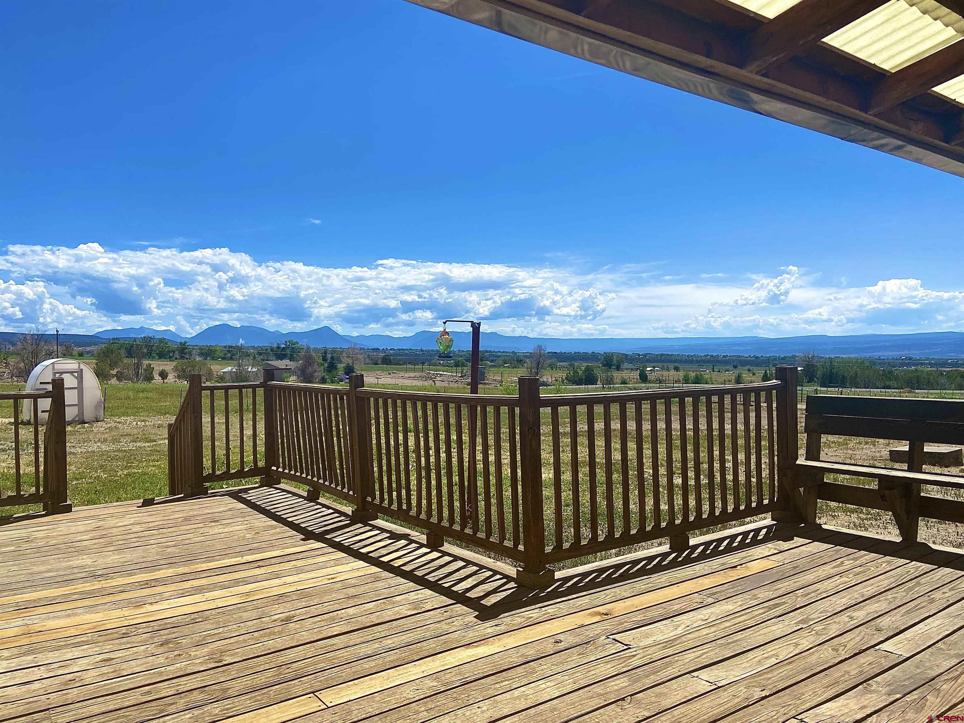 15689 2525th Road Cedaredge, CO 81413 - Photo 4 of 33 a view of a terrace with sky view