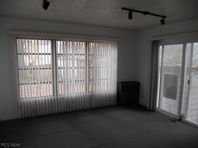 3946 Bushnell Road University Heights, OH 44118 - Photo 6 of 12 First Floor Family Room with Sliding Glass Doors Leading to the 2 Car Detached Garage and Backyard