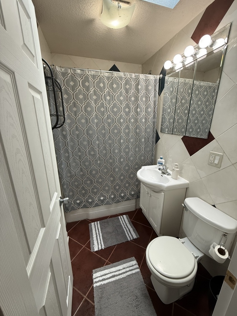 4326 151st Street Midlothian, IL 60445 - Photo 15 of 26 a bathroom with a toilet sink and shower