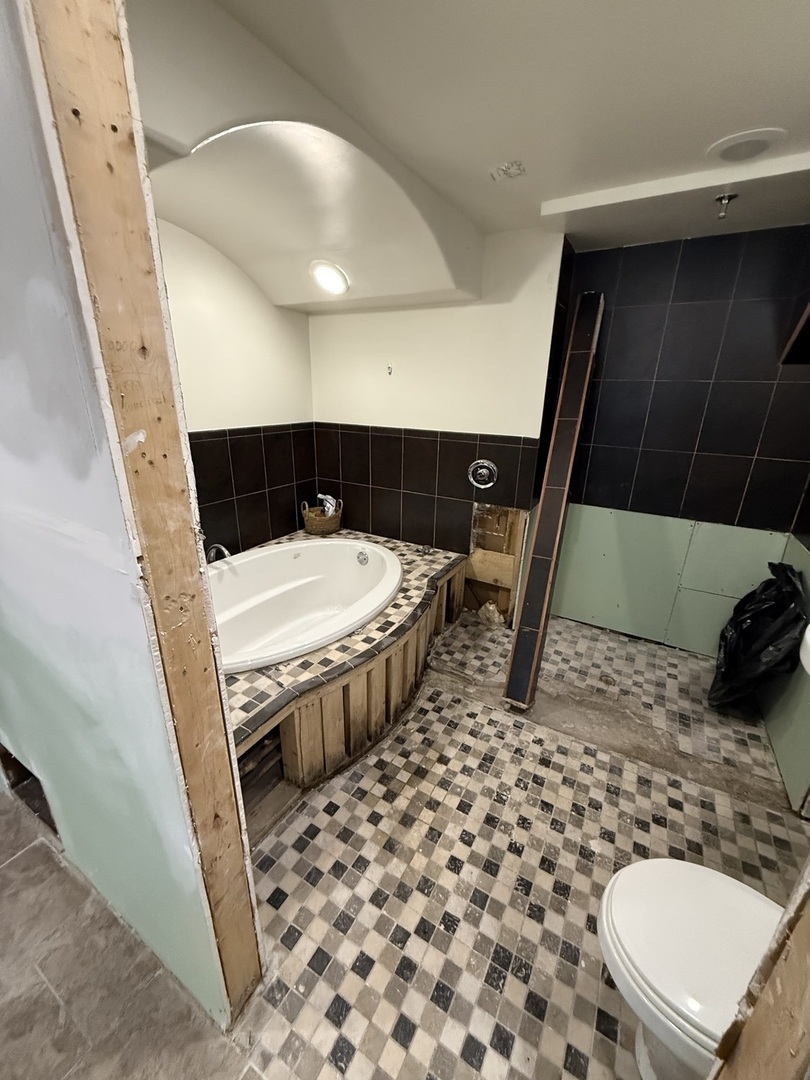 4326 151st Street Midlothian, IL 60445 - Photo 21 of 26 a bathroom with a sink toilet and shower